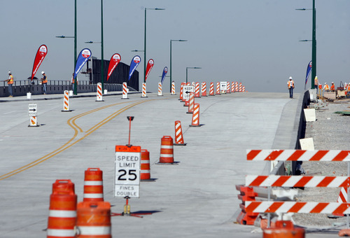 Francisco Kjolseth  |  The Salt Lake Tribune
Road guides are in place as officials get ready for a short celebration to open the rebuilt North Temple Viaduct on Wednesday, August 17, 2011.