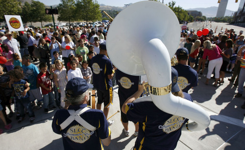 Francisco Kjolseth  |  The Salt Lake Tribune
The Salt Lake Community College Summer Spirit Band entertains the crowds gathered for the opening of the rebuilt North Temple Viaduct on Wednesday, August 17, 2011. Construction of the light rail portion will continue with an expected projected opening of the Airport TRAX line in 2013.