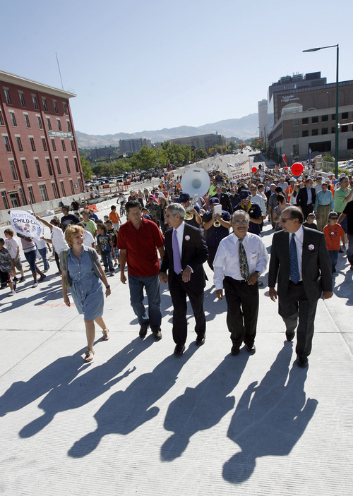 Francisco Kjolseth  |  The Salt Lake Tribune
Salt Lake City officials including city councilmembers Jill Remington Love, Van Turner, Mayor Ralph Becker, local business owner David Galvan and UTA General Manager Michael Allegra, from left, celebrate the opening of the rebuilt North Temple Viaduct on Wednesday, August 17, 2011. Construction of the light rail portion will continue with an expected projected opening of the Airport TRAX line in 2013.