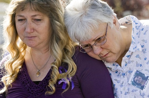 Djamila Grossman  |  The Salt Lake Tribune

Debbie Caldwell, left, and Michele Oreno, friends of Susan Cox Powell, get emotional during a ceremony and balloon release to mark Powell's birthday at West View Park, in West Valley City, Saturday, Oct., 16, 2010.