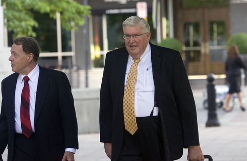 Al Hartmann  |  The Salt Lake Tribune

Dewey MacKay, right, a Brigham City doctor charged with illegally prescribing millions of pain pills, walks with his lawyer to Frank Moss Federal Courthouse last month for the opening of trial.