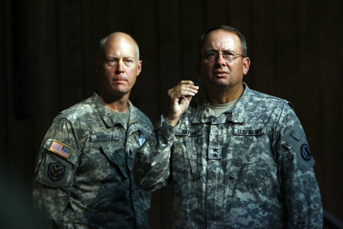 Francisco Kjolseth  |  The Salt Lake Tribune
Lt. Col. James Bledsoe, left, and Maj. Gen. Brian Tarbet, the adjutant general of the Utah National Guard, meet with soldiers, their families and employers in Lehi on Saturday to try to take care of any fallout that could occur from recent changes in plans. Members of the first of the 211th aviation unit of the Utah National Guard were preparing for a September deployment to Iraq, although orders were still tentative. Due to the political landscape in Iraq, that deployment has now been pushed off until 2013. But some members of this unit had already quit jobs in order to deploy. This affects nearly 400 soldiers and their families.