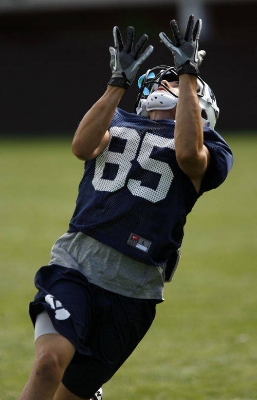 Francisco Kjolseth  |  The Salt Lake Tribune
Wide Receiver Dallin Cutler readies his hands during BYU football practice on Monday, August 15, 2011 on the practice field in Provo.