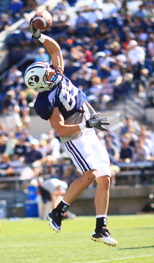 BYU wide receiver Dallin Cutler (85) leaps to catch the ball during BYU football practice at Lavell Edwards Stadium in Provo Saturday, August 13, 2011. Mario E. Ruiz for the Salt Lake Tribune.