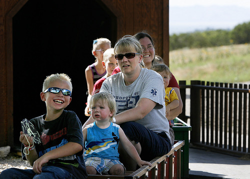 Scott Sommerdorf  |  The Salt Lake Tribune
Visitors enjoy the ride on the train at This is The Place Heritage Park in Salt Lake City, Thursday July 29, 2011.