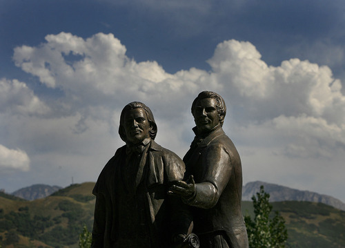 Scott Sommerdorf  |  The Salt Lake Tribune
A statue of Joseph and Brigham Young stands near the visitor's center at This is The Place Heritage Park in Salt Lake City, Thursday July 29, 2011.