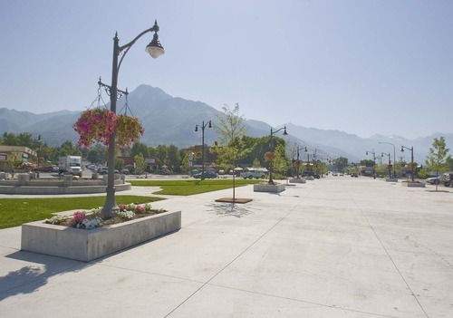 Paul Fraughton  |  The Salt Lake Tribune.  A plaza has been built at the site of the Holladay Village Center.  Tuesday  August 16, 2011