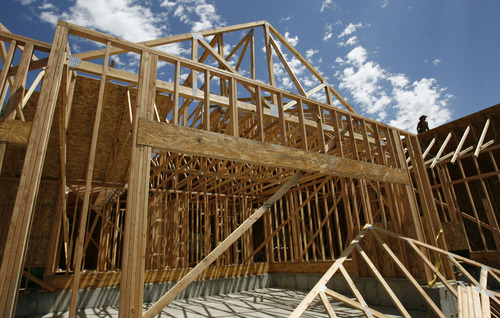 Francisco Kjolseth  |  The Salt Lake Tribune
Ivory Homes and other Utah builders took out more building permits in July than a year ago, but activity is off from peak years.