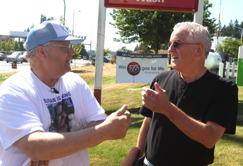 Rick Egan   |  The Salt Lake Tribune
Chuck Cox, father of Susan Powell, exchanges words with Steve Powell, father of Joshua Powell, at a shopping center in Puyallup, Wash., Saturday.