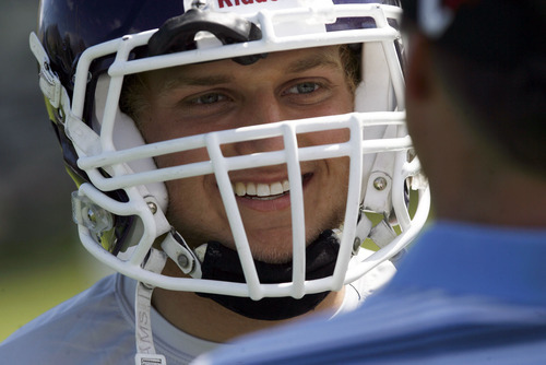 Francisco Kjolseth  |  The Salt Lake Tribune
Scott Brady, a senior at Tooele High, talks about having his brother Kyle Brady as coach. Kyle Brady, a Tooele High School alum and former University of Utah linebacker, was working with his team on Thursday, August 18, 2011, his first year as the head coach of his alma mater in Tooele.