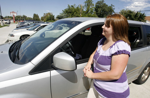 Francisco Kjolseth  |  The Salt Lake Tribune
Sharon Vinson of Sandy waits to pick up her two sons Zach, 12, and V.J. 14, from Midvale Middle school on the first day of school for the year on Monday, August 22, 2011. Middle school is a transition time for seventh-graders and their parents as students are grappling with new academic and social challenges and parents are watching their kids become increasingly independent. It was Zachary's first day of seventh grade.