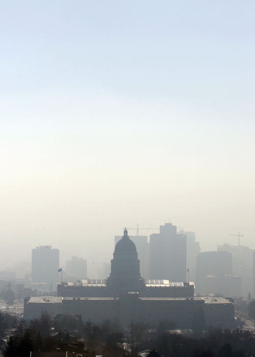 Francisco Kjolseth | The Salt Lake Tribune
A nasty swill of pollution and trapped cold air obscures the Salt Lake City skyline beyond the Utah Capitol in 2009.