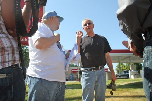 Rick Egan   |  The Salt Lake Tribune
Chuck Cox, father of Susan Powell, exchanges words with Steve Powell, father of Joshua Powell, at a shopping center in Puyallup, Wash., Saturday.