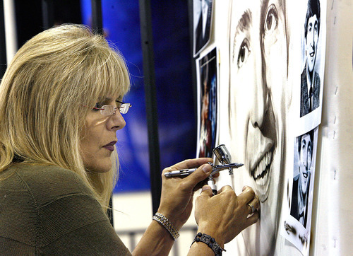 Scott Sommerdorf  |  The Salt Lake Tribune
Shannon MacDonald, known as the world's greatest Beatles artist, airbrushes a portrait of John Lennon that will be unveiled during International Beatle Week in Liverpool later this month. She headlined a three-day workshop at ASET, a West Valley City-based distributor of air-brushing equipment.