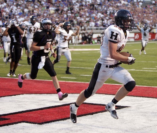 Trent Nelson  |  The Salt Lake Tribune
Herriman's David Christensen pulls in the game-winning pass on a two-point conversion. Herriman vs. Riverton High School football at Rice-Eccles Stadium in Salt Lake City, Utah, Saturday, August 27, 2011.