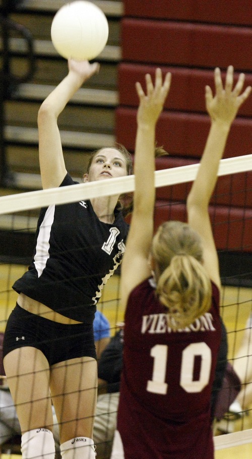 Chris Detrick  |  The Salt Lake Tribune
Cottonwood's Rachel Wyss (17) hits the ball past Viewmont's Taya Adams (10) during the match at Viewmont High School Tuesday August 23, 2011.