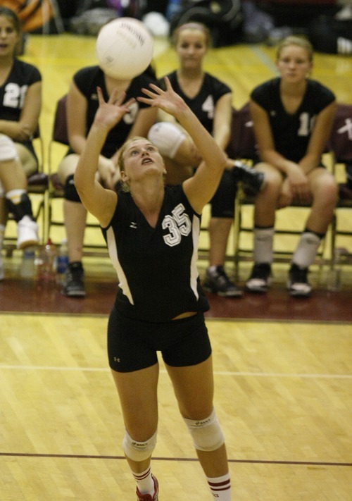 Chris Detrick  |  The Salt Lake Tribune
Cottonwood's Taylor Drowne (35) sets the ball during the match at Viewmont High School Tuesday August 23, 2011.