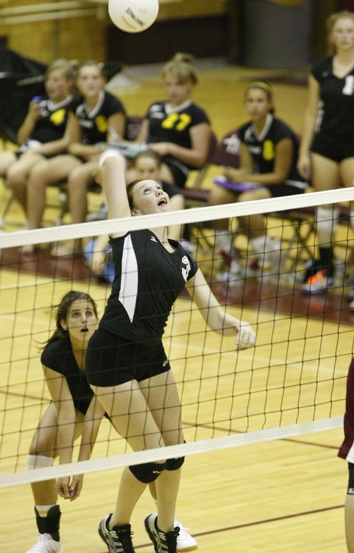 Chris Detrick  |  The Salt Lake Tribune
Cottonwood's Kiana Aalona (3) spikes the ball during the match at Viewmont High School Tuesday August 23, 2011.