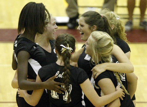 Chris Detrick  |  The Salt Lake Tribune
Cottonwood celebrates a point during the match at Viewmont High School Tuesday August 23, 2011.