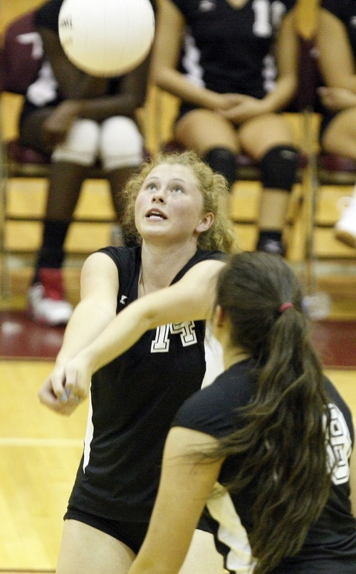 Chris Detrick  |  The Salt Lake Tribune
Cottonwood's Hannah Call (14) hits the ball during the match at Viewmont High School Tuesday August 23, 2011.