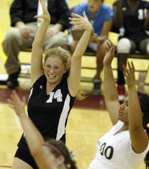 Chris Detrick  |  The Salt Lake Tribune
Cottonwood's Hannah Call (14) celebrates a point during the match at Viewmont High School Tuesday August 23, 2011.