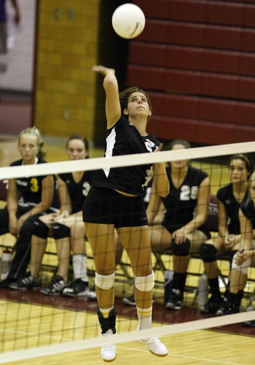 Chris Detrick  |  The Salt Lake Tribune
Cottonwood's Amanda Ayre (22) spikes the ball during the match at Viewmont High School Tuesday August 23, 2011.