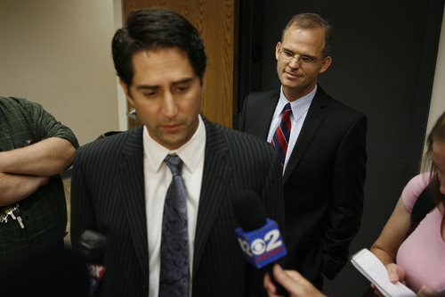 Francisco Kjolseth  |  The Salt Lake Tribune
Former U.S. Attorney Brett Tolman, left, speaks to the media on behalf of Provo Councilman Steve Turley after Turley made his first appearance in 4th District Court in Provo, on fraud counts, on Wednesday, Aug. 24, 2011.
