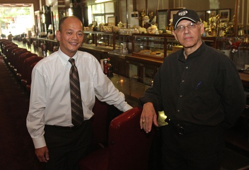 Rick Egan   |  The Salt Lake Tribune

Lamb's new owner, Francis Liong, stands with John Speros at Lamb's Grill Cafe, Friday, Aug. 26, 2011. John Speros has sold Lamb's Grill Cafe, Utah's oldest continually operating restaurant.