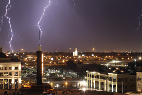 Lennie Mahler  |  The Salt Lake Tribune
A thunderstorm makes its way across the Salt Lake Valley, as seen from The Gateway mall in Salt Lake City on Sunday, Aug. 28, 2011.