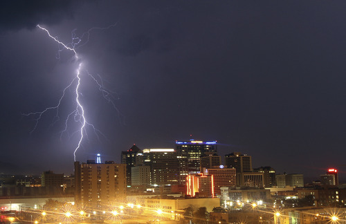 Lennie Mahler  |  The Salt Lake Tribune
A thunderstorm makes its way across the Salt Lake Valley over the downtown skyline on Sunday, Aug. 28, 2011.