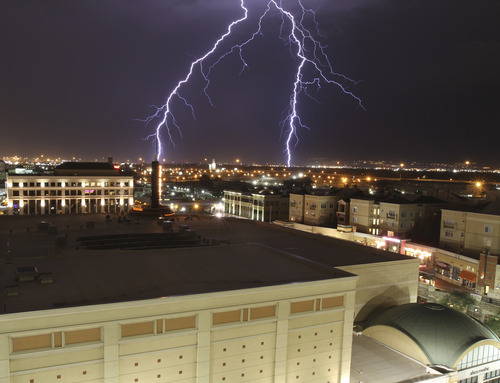 Lennie Mahler  |  The Salt Lake Tribune
A thunderstorm makes its way across the Salt Lake Valley, as seen from The Gateway mall in Salt Lake City on Sunday, Aug. 28, 2011.