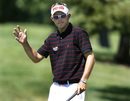 Scott Sommerdorf  |  The Salt Lake Tribune
Clay Ogden acknowledges the applause from the gallery after making a putt on 13 on his way to winning the Utah Open at Oakridge Country Club in Farmington, Sunday, August 28, 2011, with score of 17 under.