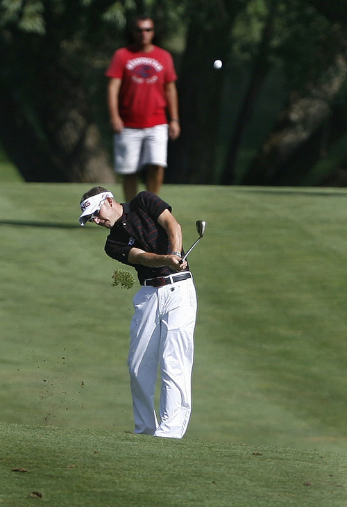 Scott Sommerdorf  |  The Salt Lake Tribune
Clay Ogden hits his approach shot on 18 on his way to winning the Utah Open at Oakridge Country Club in Farmington, Sunday, August 28, 2011, with score of 17 under.