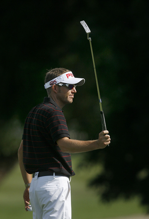 Scott Sommerdorf  |  The Salt Lake Tribune
Clay Ogden reacts to sinking his final putt on 18 to seal his win in the Utah Open at Oakridge Country Club in Farmington, Sunday, August 28, 2011. He finished with score of 17 under.