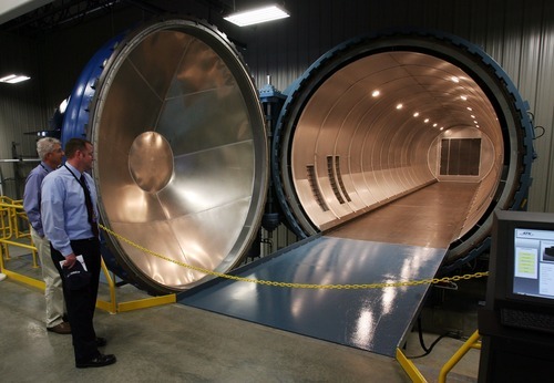 Steve Griffin  |  The Salt Lake Tribune

Guests get a close look at a giant autoclave during grand opening at ATK's Aircraft Commercial Center of Excellence facility in Clearfield, Utah Monday, August 29, 2011.  The autoclave cure the composite parts.