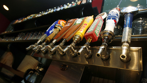 Francisco Kjolseth  |  The Salt Lake Tribune
Beer taps may soon need to also be obscured from the public as beer taps sit in plain view at Wing Nutz in Sugarhouse on Monday, Aug. 29, 2011.