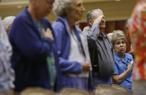 Francisco Kjolseth  |  The Salt Lake Tribune
Jae Toone of Riverton salutes as the Northridge High Jr. ROTC presents the colors during the 24th Annual Conference for Seniors, hosted by Senator Orrin and Elaine Hatch gathers at the Little America Hotel in Salt Lake City on Monday, August 29, 2011. The featured keynote address came from James Baker, III, former Chief of Staff to Presidents Reagan and George H. W Bush, and former Secretary of the Treasury and Secretary of State.