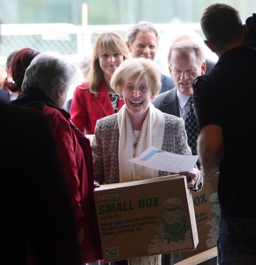 Steve Griffin  |  The Salt Lake Tribune

Beverley Taylor Sorenson, front to back, her son Jim Sorenson, Dee Moooney, of The Micron Foundation, and Salt Lake City Mayor Ralph Becker carry ceremonial boxes into The Leonardo during a move-in day event at The Leonardo in Salt Lake City on Monday, April 25, 2011. The Sorenson Legacy Foundation and The Micron Foundation are major donors to The Leonardo. The long-awaited science and art center is scheduled to open its doors in October.