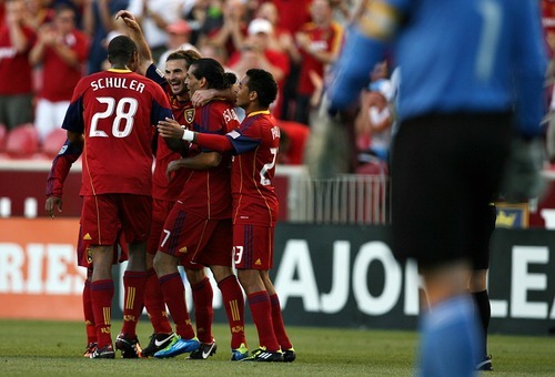 Djamila Grossman  |  The Salt Lake Tribune

Real Salt Lake plays Philadelphia Union at Rio Tinto Stadium in Sandy, Utah, on Saturday, Sept. 3, 2011. RSL's players celebrate after they scored a goal in the first half.