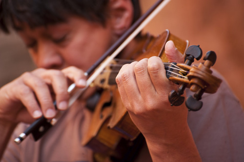 Violinist Ian Swensen plays in a Grotto Concert at the Moab Music Festival on Sept. 4, 2011.
Neal Herbert  |  Special to the Tribune