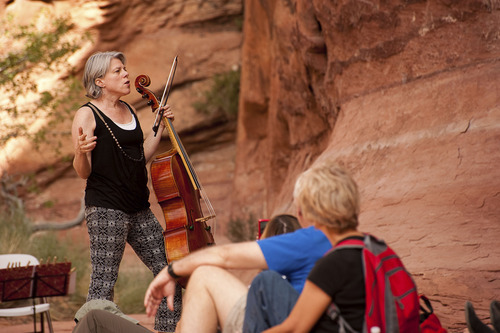 Cellist Tanya Tomkins introduces Bach's Suite in D, BWV 1012, for solo cello in a Grotto Concert at the Moab Music Festival on Sept. 4, 2011.
Neal Herbert  |  Special to the Tribune