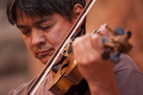 Violinist Ian Swensen plays in a Grotto Concert at the Moab Music Festival on Sept. 4, 2011.
Neal Herbert  |  Special to the Tribune