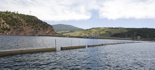 Paul Fraughton  |  The Salt Lake Tribune
The security barricade protecting the face of Flaming Gorge Dam  on Wednesday, Aug. 17, 2011.