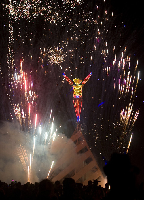 Rick Egan  | The Salt Lake Tribune 

Fireworks explode, as the Burning Man burns in the Black Rock desert, Saturday night, Sept. 3, 2011. More than 50,000 revelers met in the Nevada desert to celebrate the annual Burning Man Festival. This year marked the 25-year anniversary.