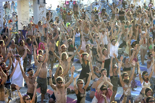Rick Egan  | The Salt Lake Tribune 

Several hundred of participants join in a yoga class on the playa in front of the the Temple of Transition, at Burning Man Festival Friday, Sept. 2, 2011.