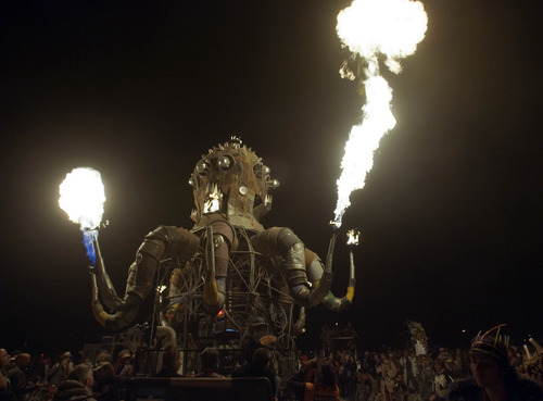 Rick Egan  | The Salt Lake Tribune 

The Flaming Octopus car shoots flames, at the Burning Man Festival, Friday, Sept. 2, 2011.