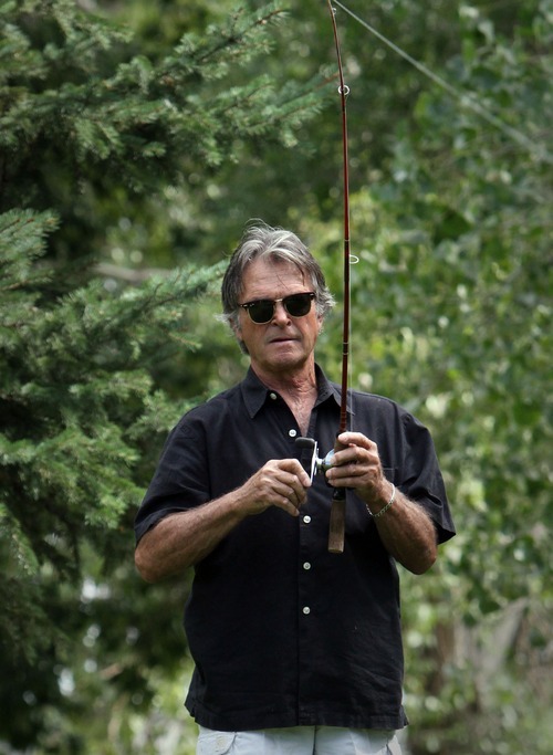 Rick Egan   |  The Salt Lake Tribune
Jack Plumb practices casting in a park near his shop in Salt Lake City Thursday. Plumb won the national casting competition as a 13-year-old in Chicago. He moved to Utah and found no interest in the event so he hung up his spinning rods. Now 64, Plumb renewed his interest in casting and ended up winning the national title this summer in Long Beach, Calif.