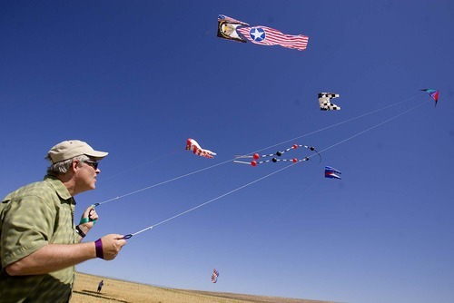 Trent Nelson  |  The Salt Lake Tribune
Ivo Stutznegger flies his kite during the Stampede Festival at Antelope Island on Saturday.