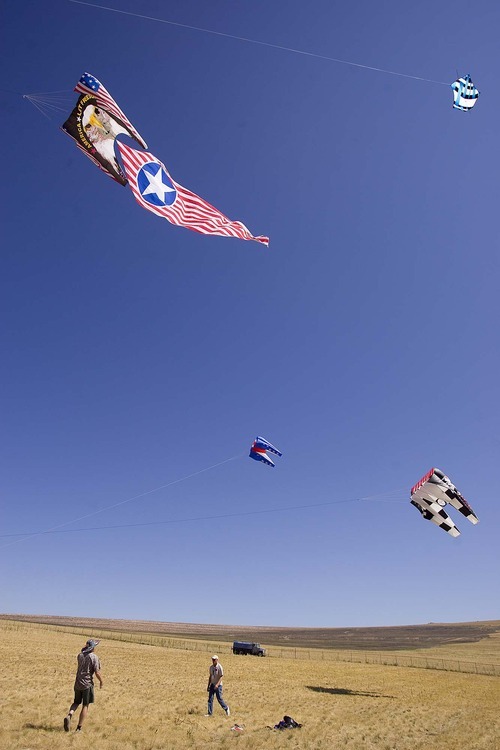 Trent Nelson  |  The Salt Lake Tribune
David Reynolds, left, and Ron Bohart came from Oregon to fly kites on Antelope Island. Large and small kites took to the skies during the Stampede Festival at Antelope Island on Saturday.