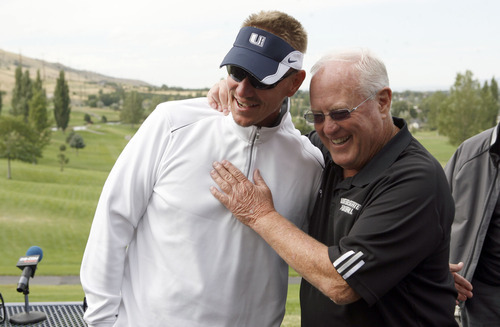 Francisco Kjolseth  |  The Salt Lake Tribune
Gary Andersen, left, and Ron McBride, the head coaches at Utah State and Weber State, respectively, get together for a brief interview at Eagle Mountain Golf Course in Brigham City on Tuesday, September 6, 2011 as they joke around about old times. The two have been career friends, and McBride has served as Andersen's mentor and also sees him as a father figure. 
Address